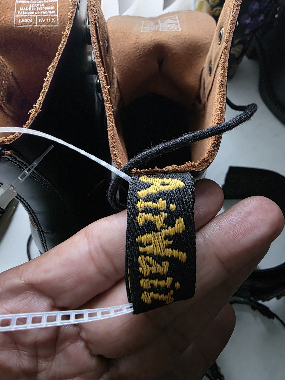 Dr. Martens Black Leather Lace-Up Platform Boots with Yellow Stitching - Picture 3 of 6